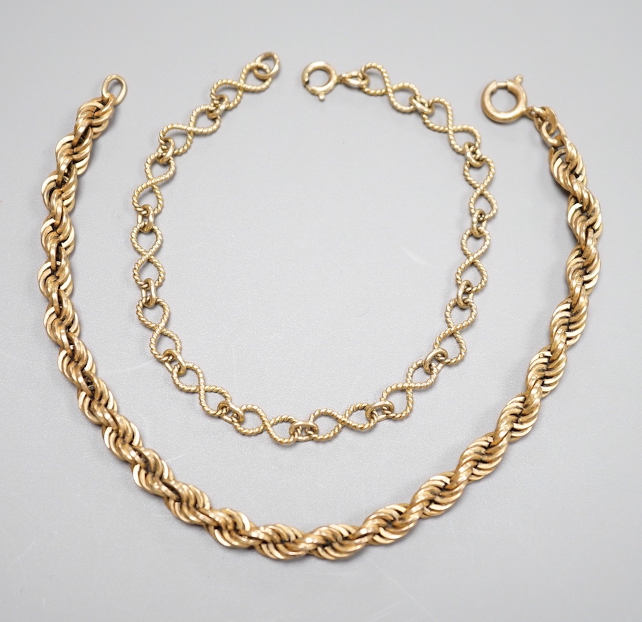 A modern 9ct fancy link bracelet, 18cm and a 9k rope twist bracelet, 21cm, 12.9 grams.